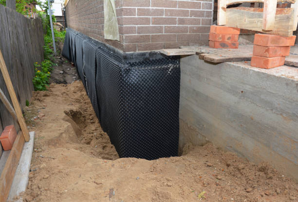 Happy homeowners after waterproofing job in Montpelier